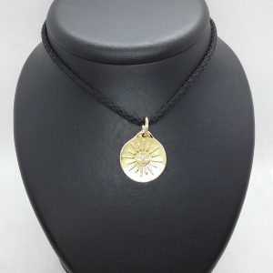 Médaille soleil