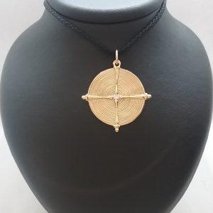 Médaille disque africain